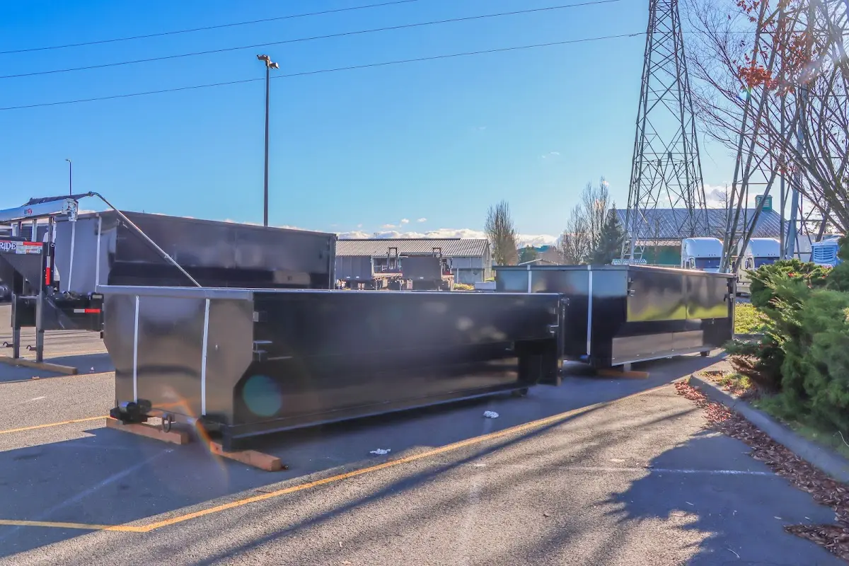 Roll-off dumpster ready for waste disposal at job site for Yard Waste Dumpster Rental in Hastings
